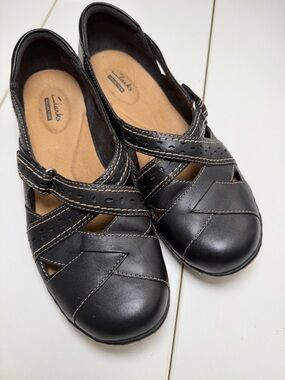 Clarks Black Leather Slip-On Flats with Contrast Stitching